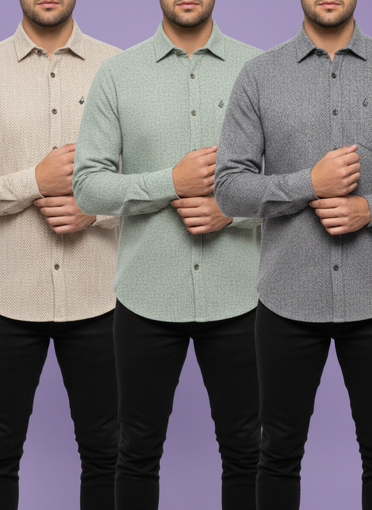 Three men wearing different patterned shirts against a purple background