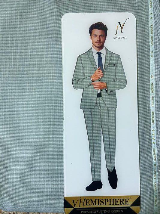 Card with a man wearing a green checkered suit on a fabric background