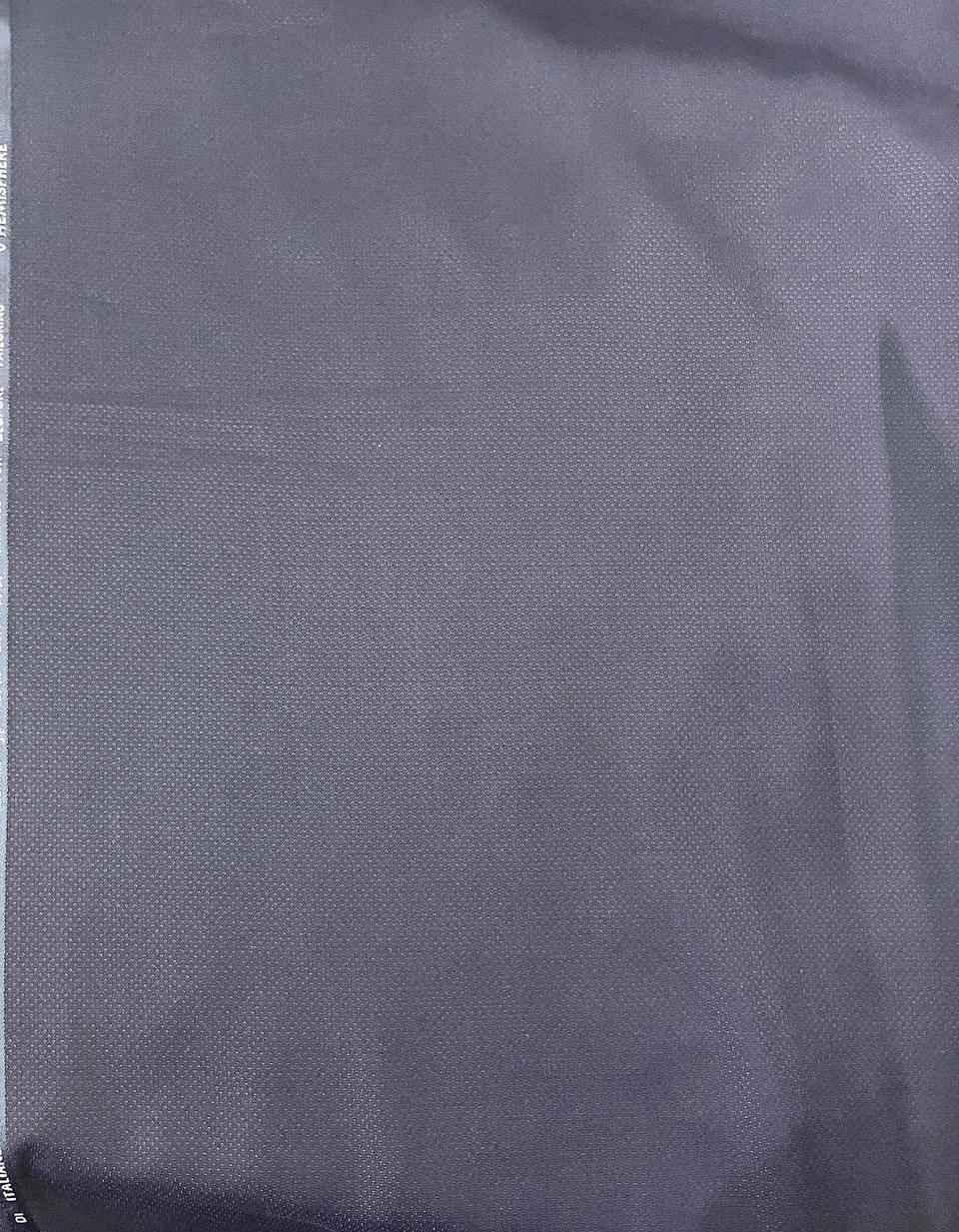 Close-up of gray fabric with a subtle pattern