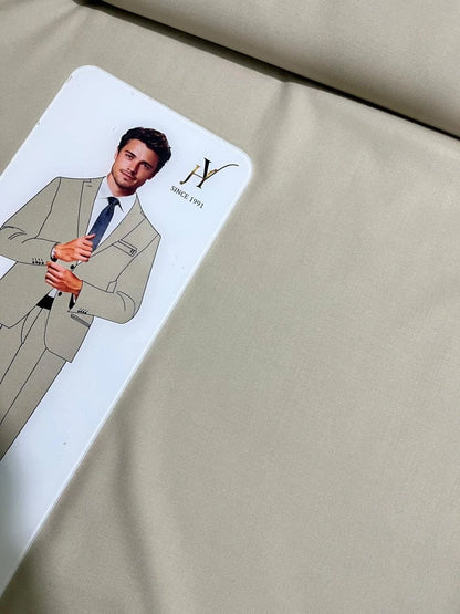 Card with a man in a suit on a beige fabric background