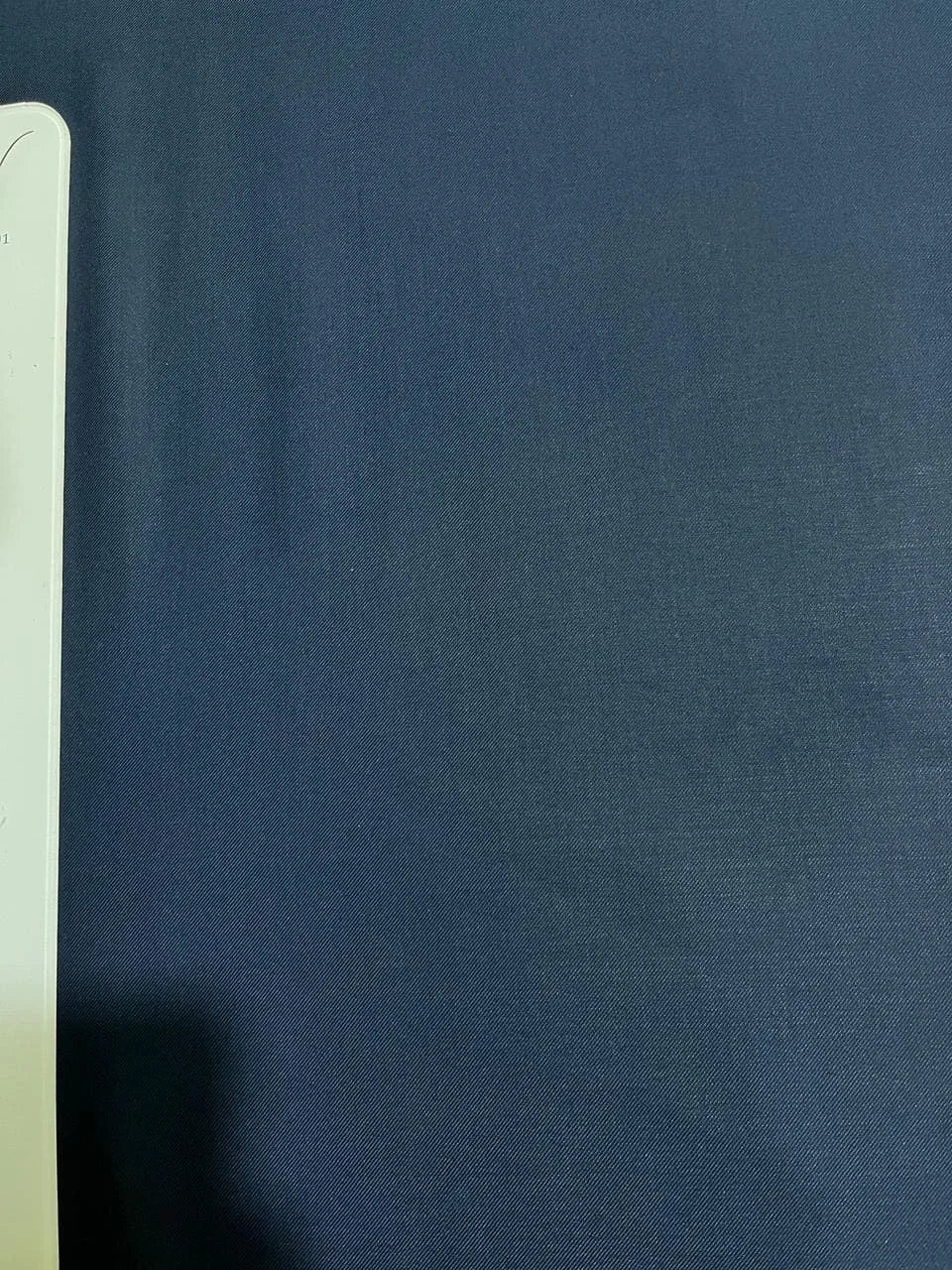 Solid blue color swatch suiting fabric