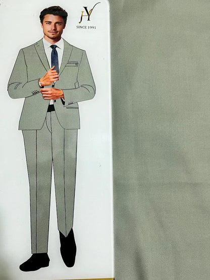 Sage green suit with a mannequin and fabric swatch on a white background