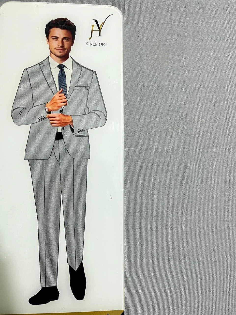 Card with a gray suit and tie on a white background