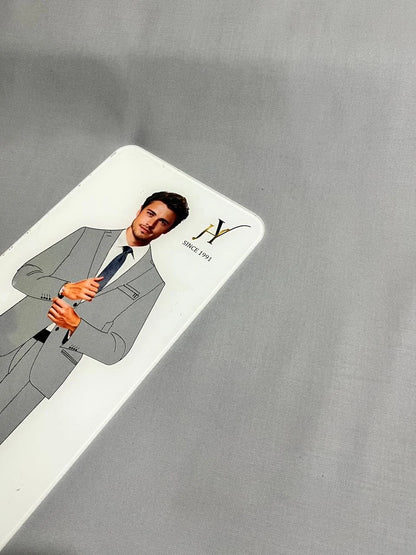 Card with a person in a suit on a gray fabrics