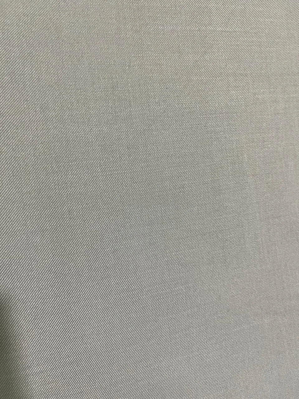 Close-up of a textured Taupe / Warm Beige fabric surface